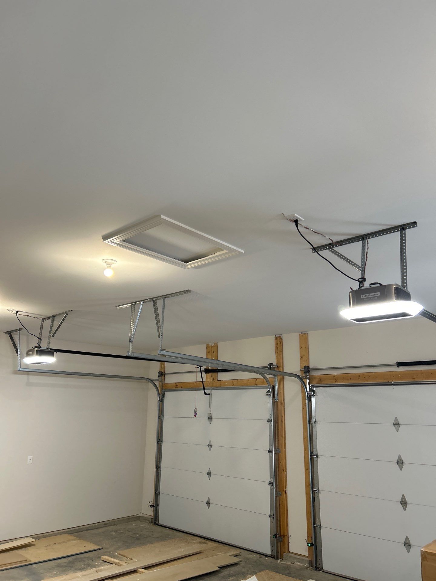 broken garage door spring showing visible gap and wear