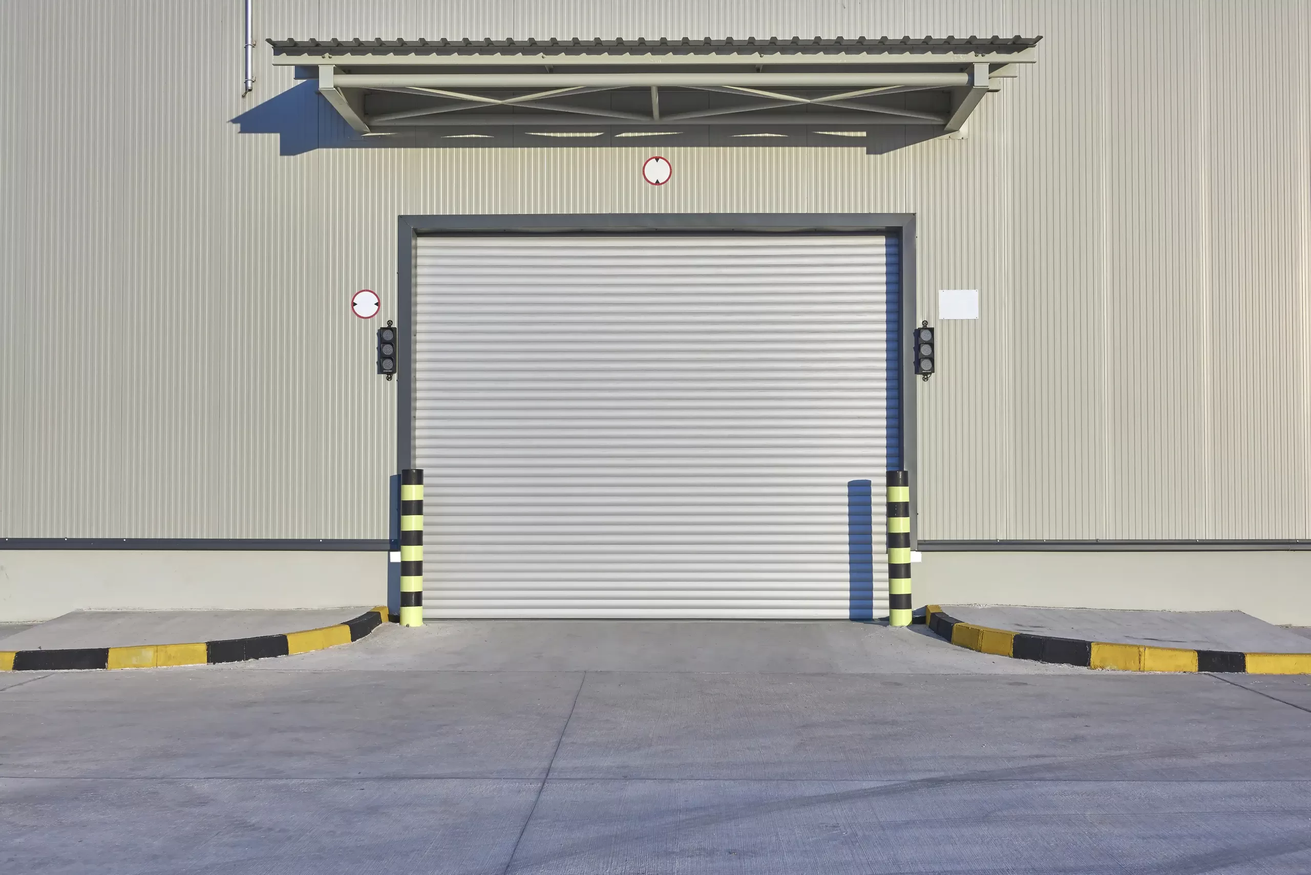 Commercial roll-up garage door at a business facility